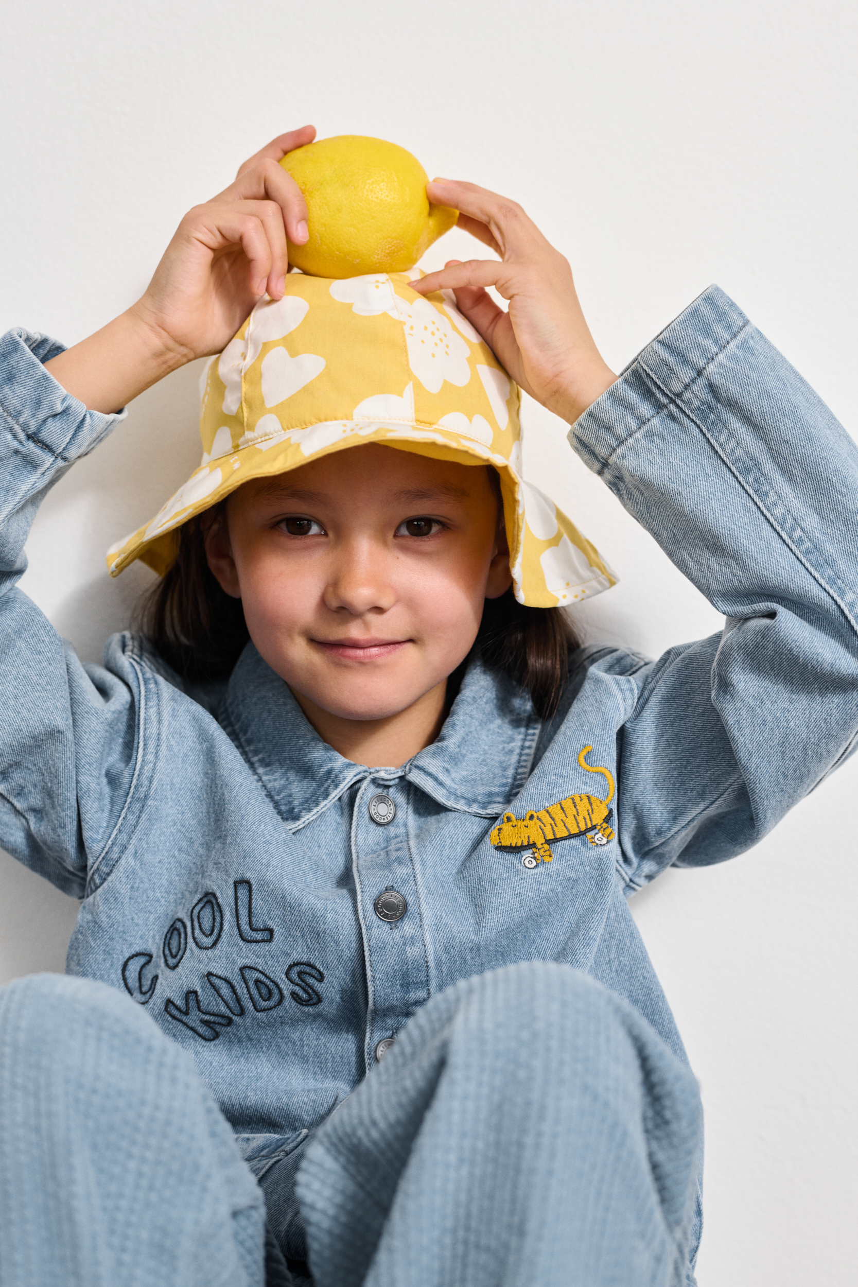 LIEWOOD Amelia Sonnenhut Wendbar, Flower/Lemon Yellow, 6-9 Monate