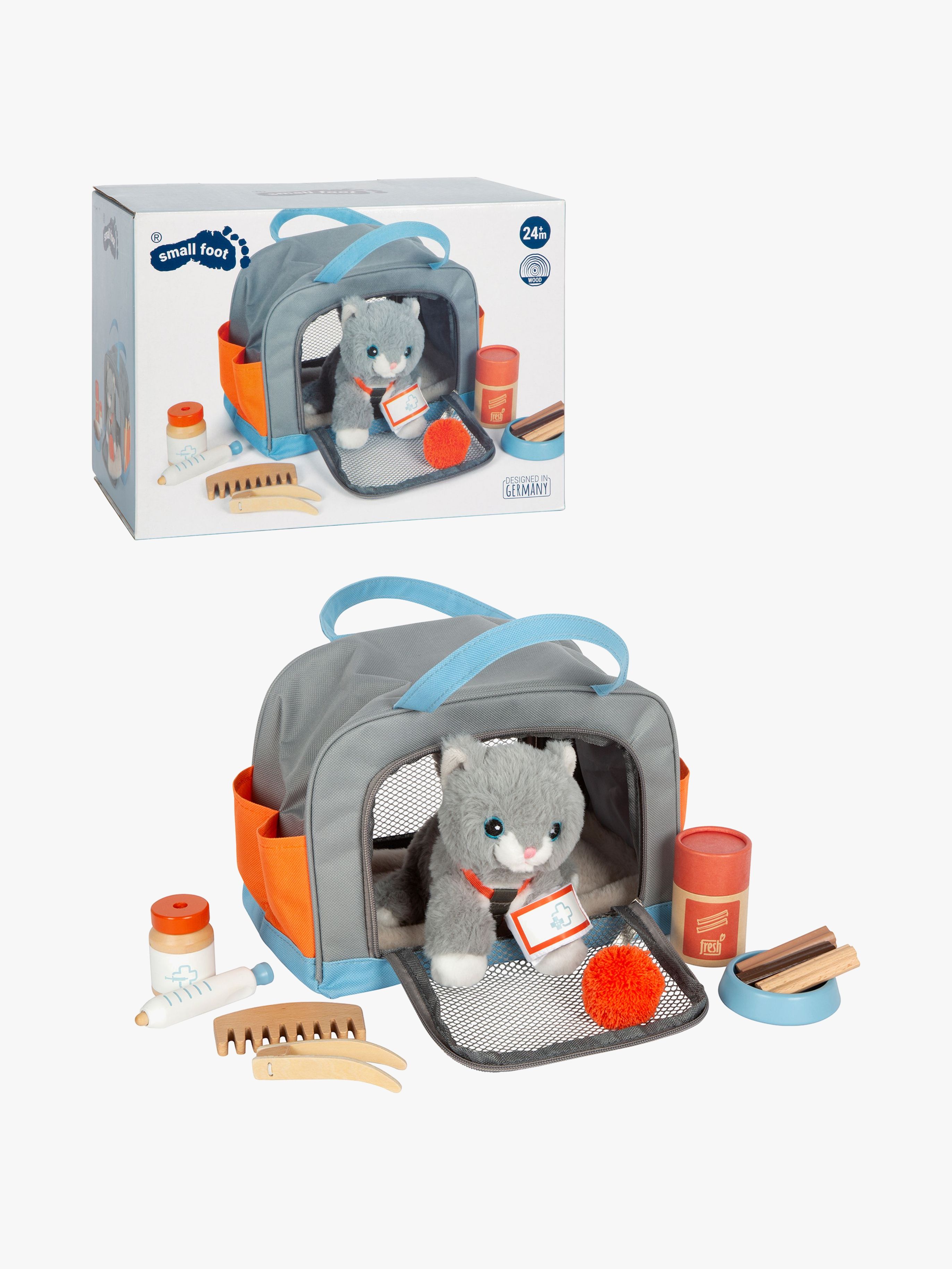 Katze mit Tasche und Pflegeset