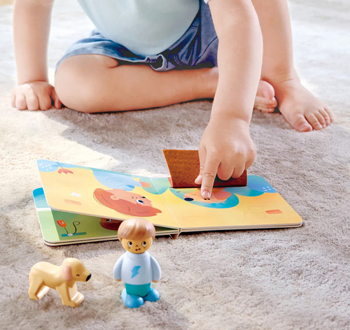 Hape Geschichtenbuch mit Spielset The Dog's New Friend