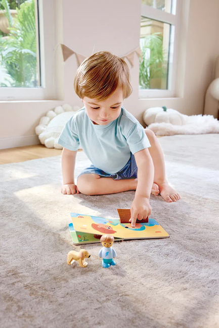 Hape Geschichtenbuch mit Spielset The Dog's New Friend